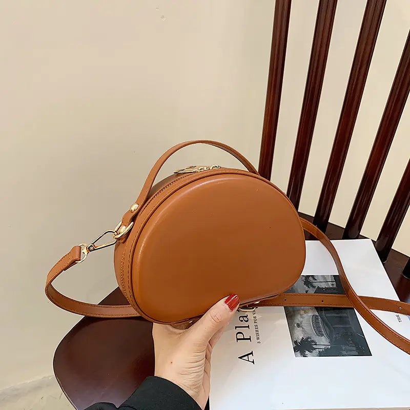 Hand-held Shell Messenger Bag