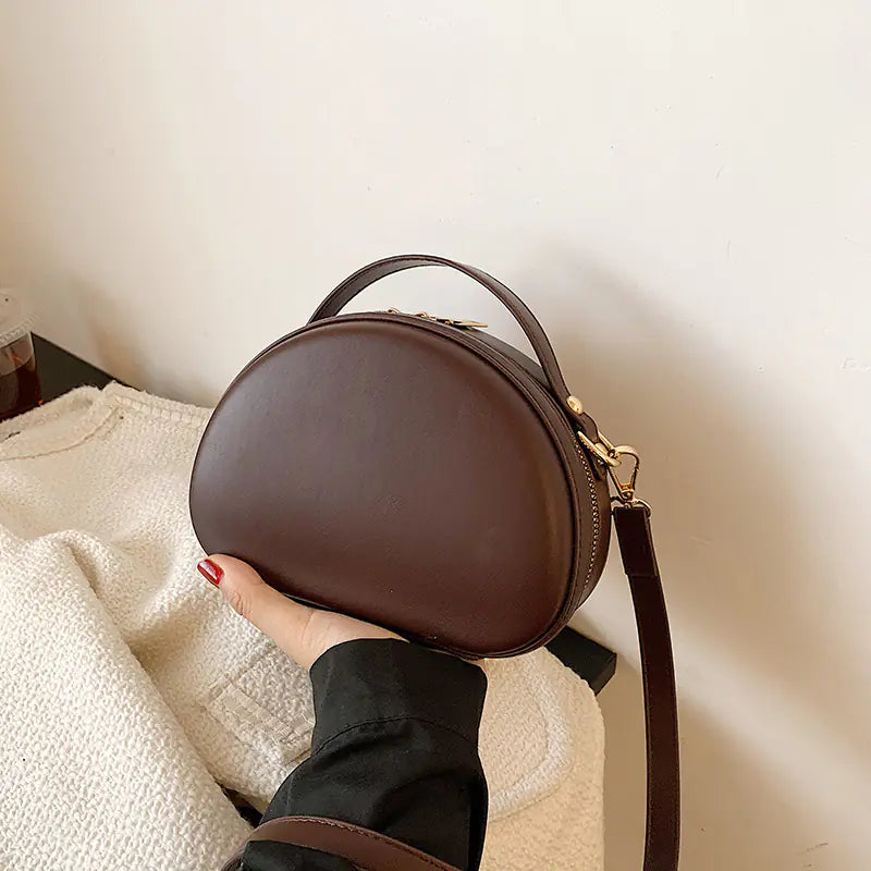 Hand-held Shell Messenger Bag