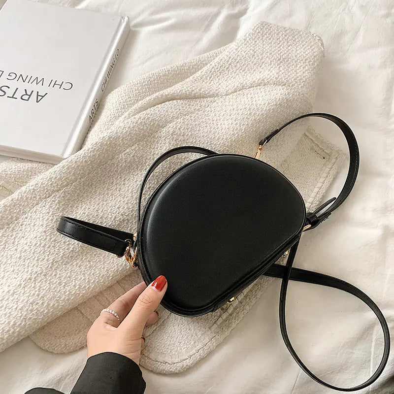 Hand-held Shell Messenger Bag